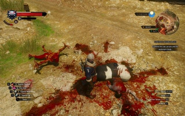 Examine the cow carcass and the workman's body.