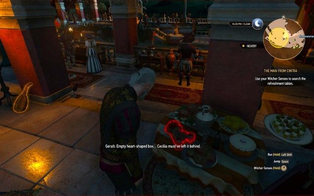 Use your Witcher Senses to search the refreshment tables.