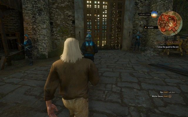 Follow the guard to the exit.